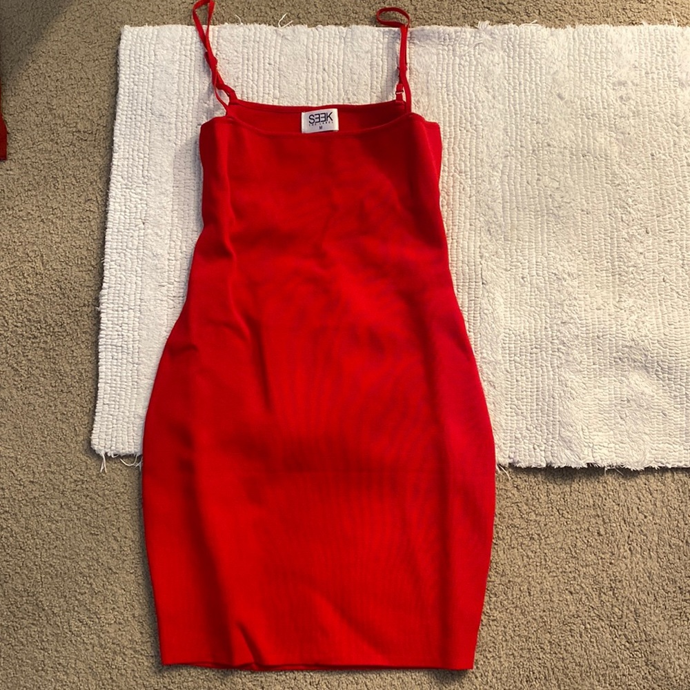 Tight, red figure fitting dress